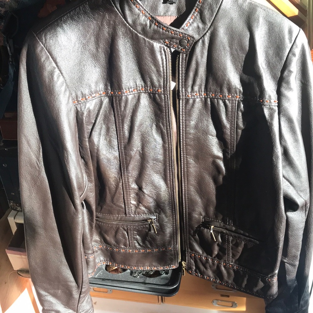 Classic, vintage, chocolate brown, The leather ranch leather coat.